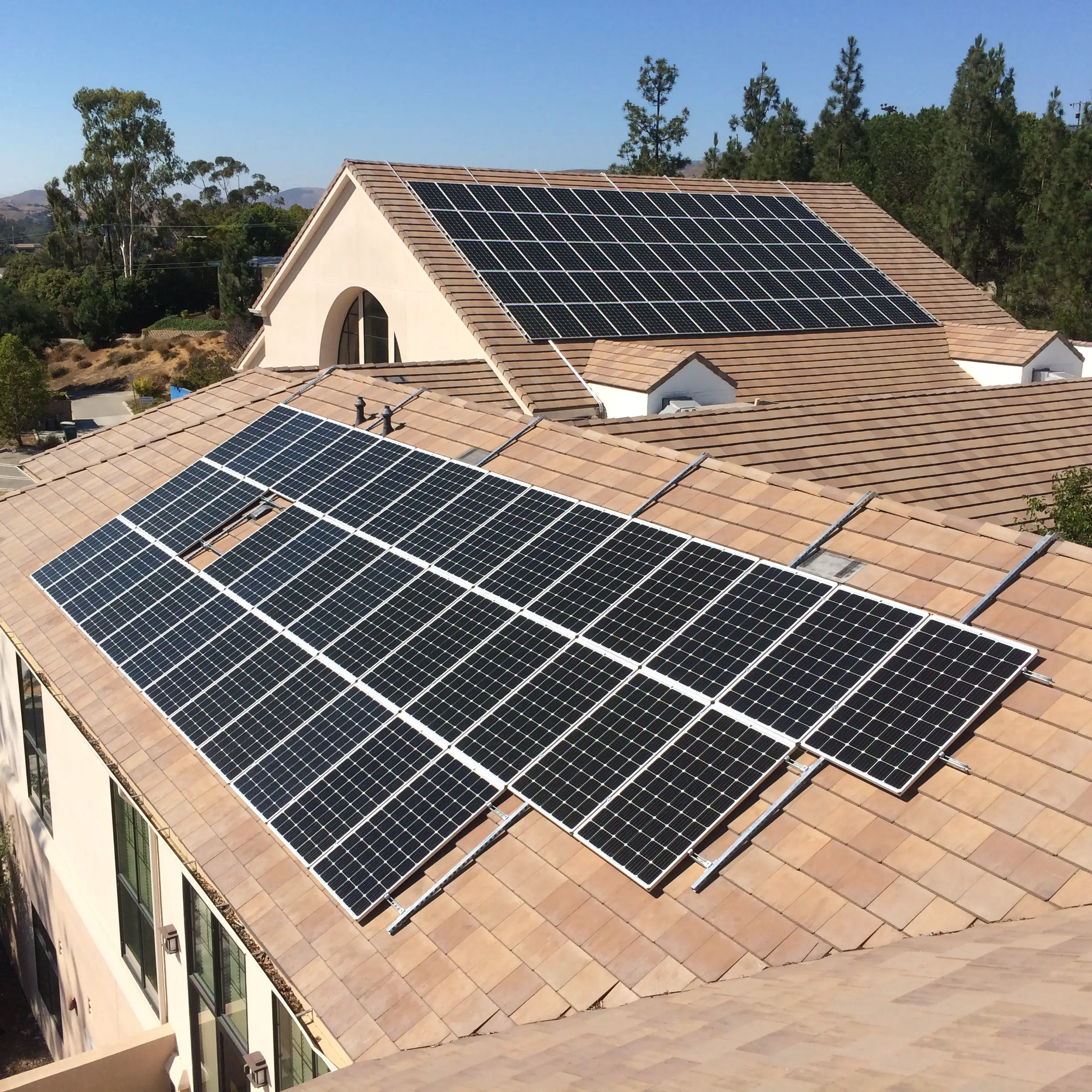 Is it possible to install solar on a sloped roof without drilling holes?