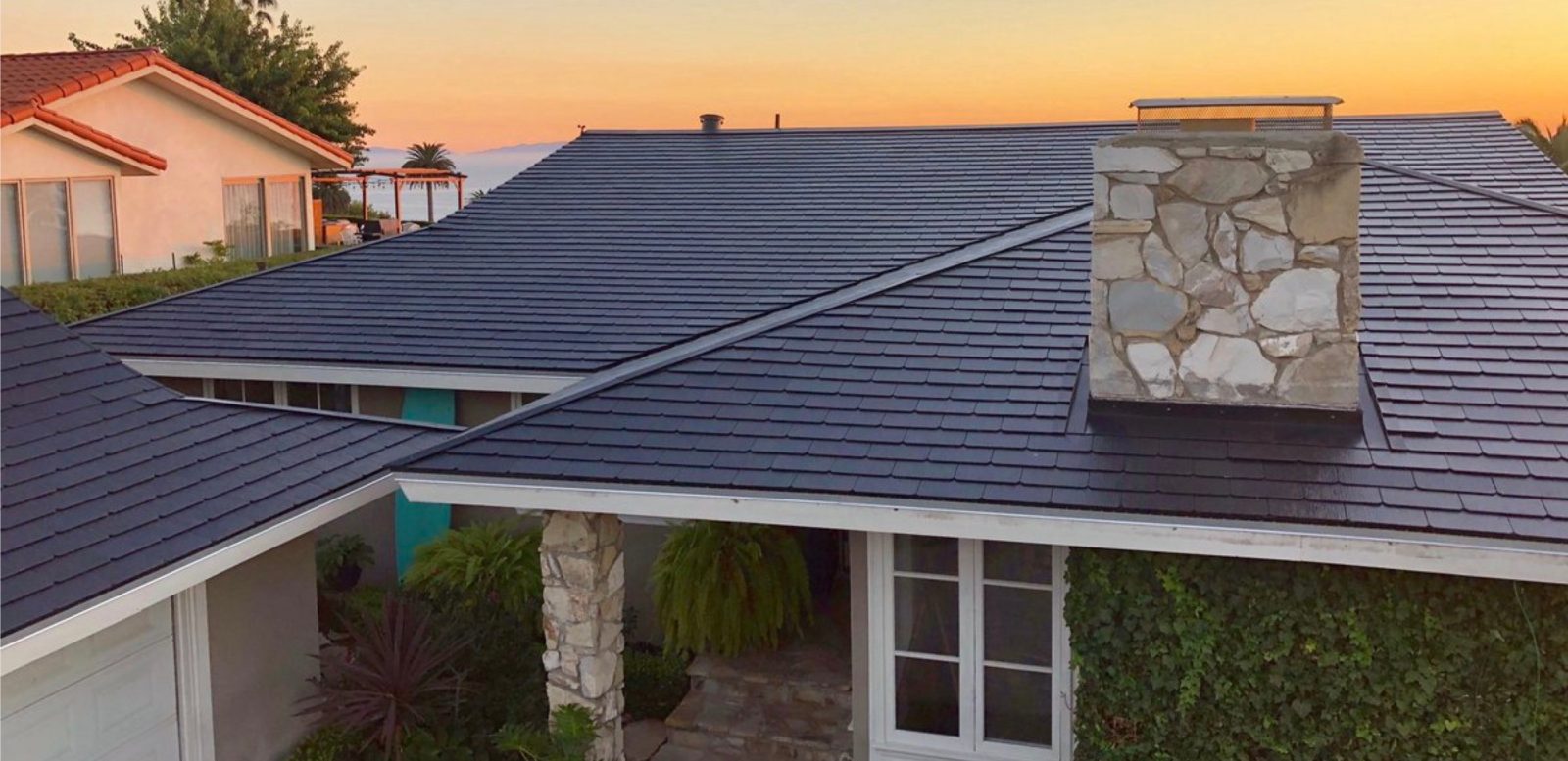 Tesla Solar Roof volume production is delayed to next year